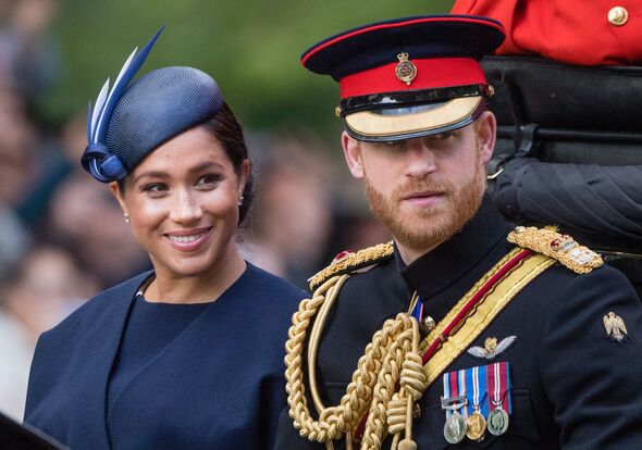 Prince Harry's awkward balcony moment with Meghan goes viral