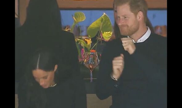 Prince Harry dances next to Meghan Markle